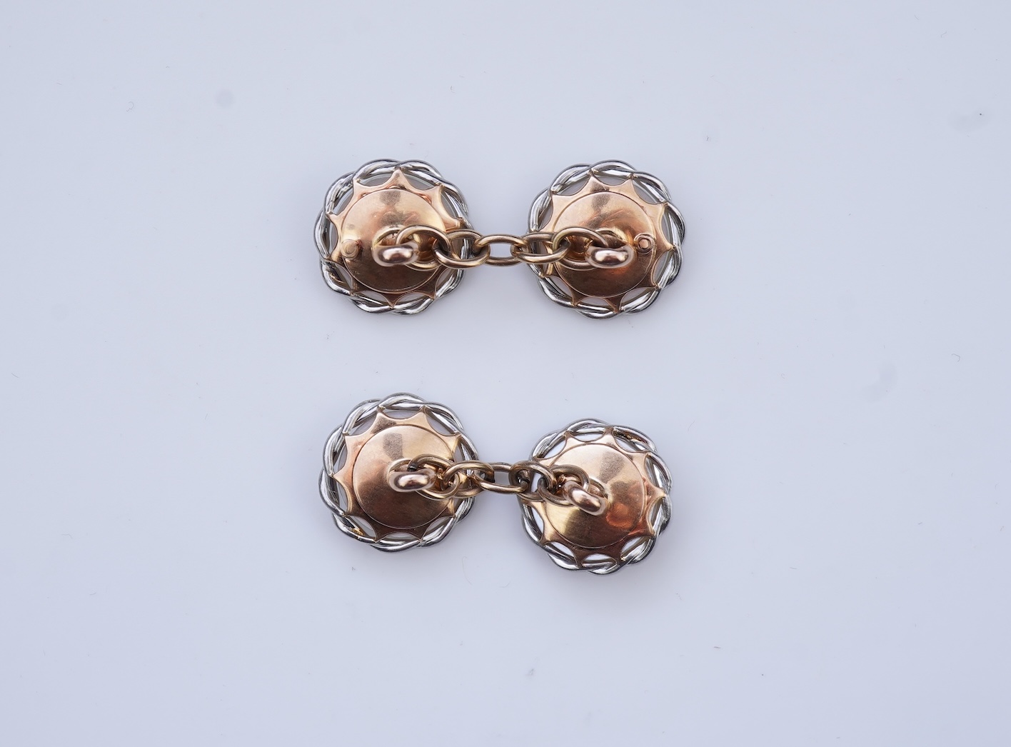 A pair of mother of pearl cufflinks, early 20th century